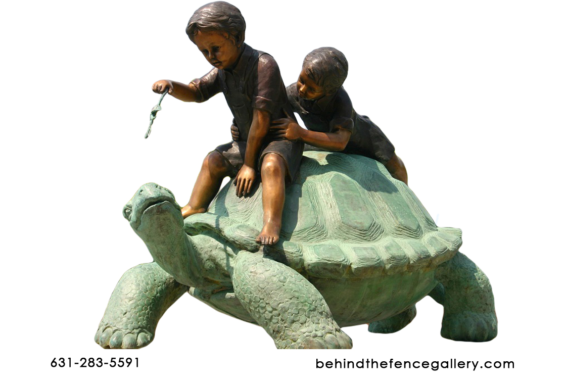 2 Boys Playing on a Turtle