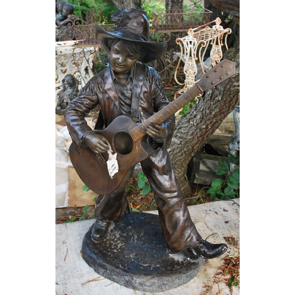 Bronze Boy Playing a Guitar