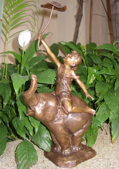 Boy on Elephant Boy on Elephant